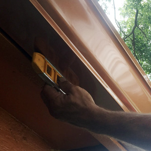 Making sure copper color gutters are level